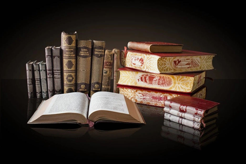 A scholar carefully examining an ancient text in a library